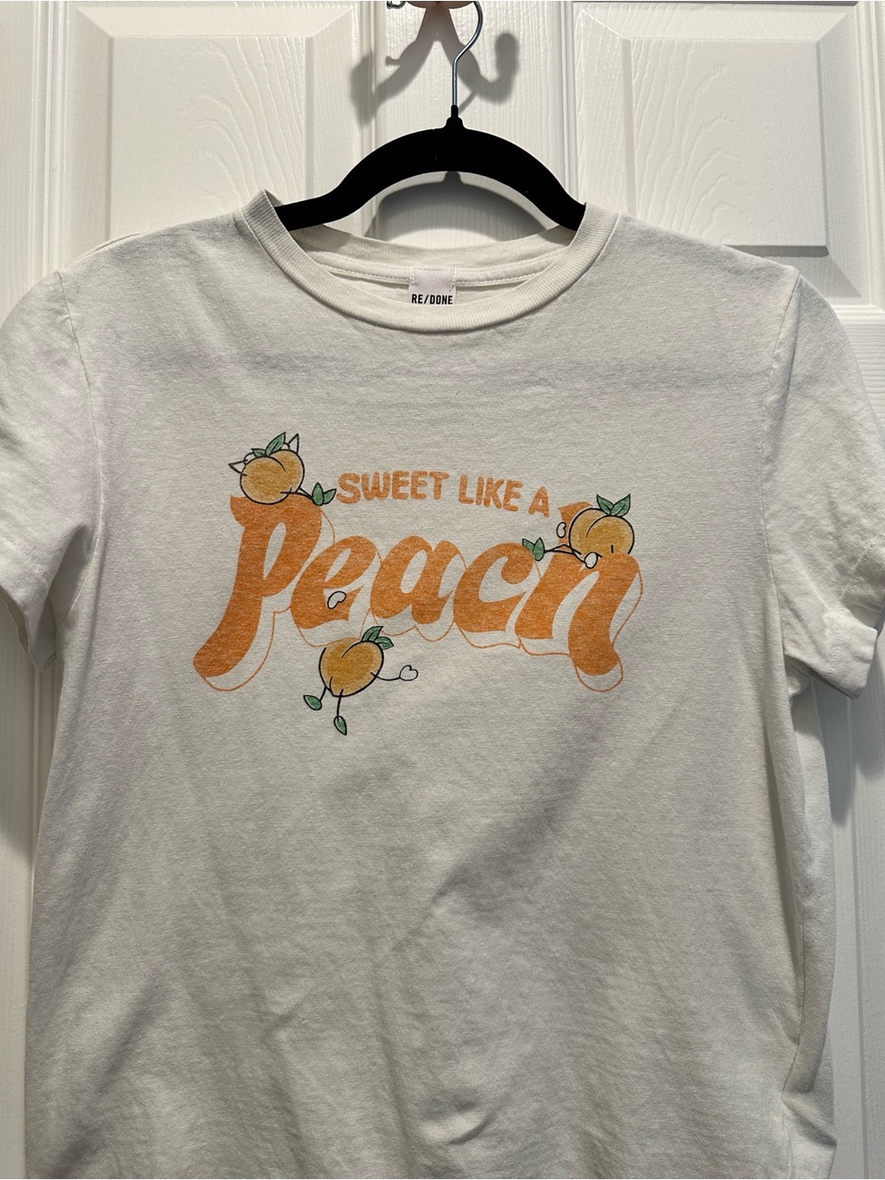 Re/Done Women’s  White Tee with Orange Peach Graphic